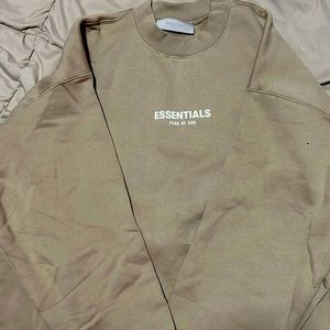 FEAR OF GOD ESSENTIALS SWEATER.. Never worn at all. Brand new. Size Large.